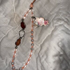 Pink labubu phone strap